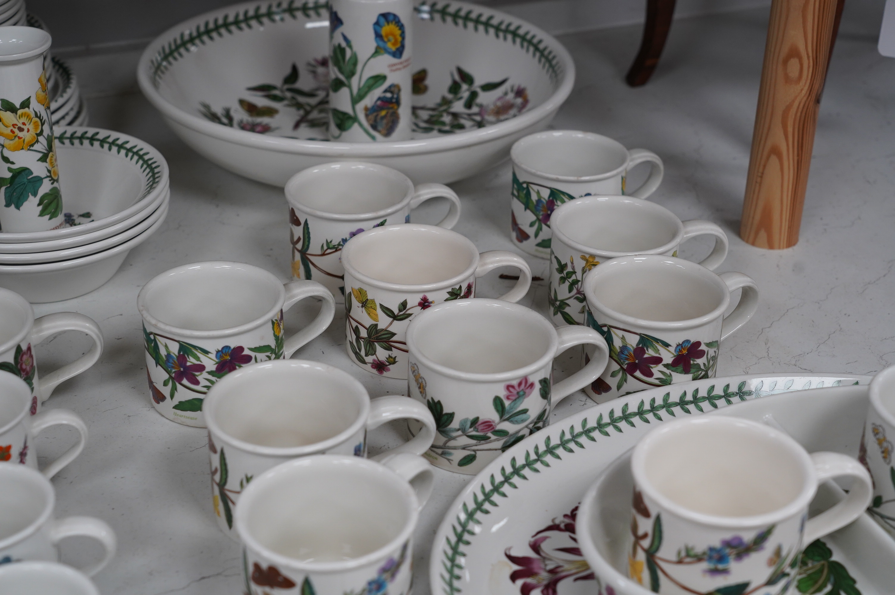 A mixed quantity of Portmeirion Botanic Garden tea, coffee and dinner wares, including a teapot, jugs, cups, plates, dishes, Jardene, etc. Condition - fair to good